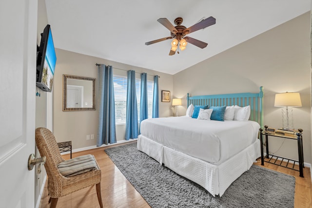 bedroom featuring ceiling fan and light hardwood / wood-style floors