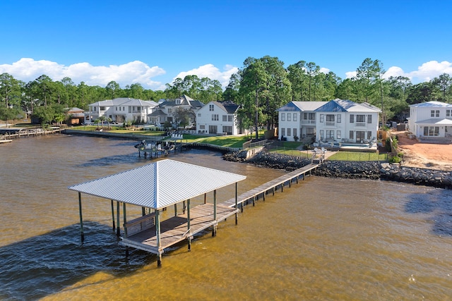 dock area with a water view