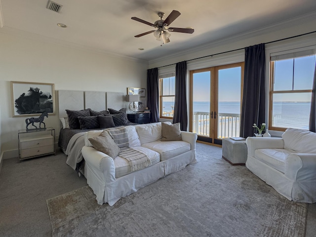 carpeted bedroom with access to exterior, ceiling fan, french doors, a water view, and ornamental molding