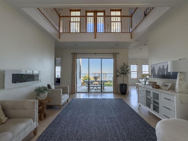 interior space featuring a towering ceiling