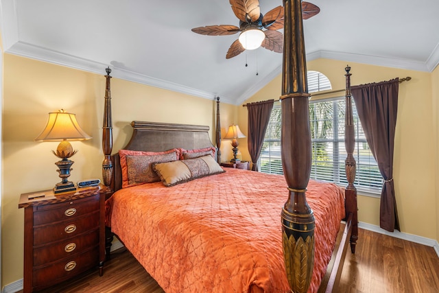 bedroom featuring ceiling fan, dark wood-type flooring, vaulted ceiling, and ornamental molding