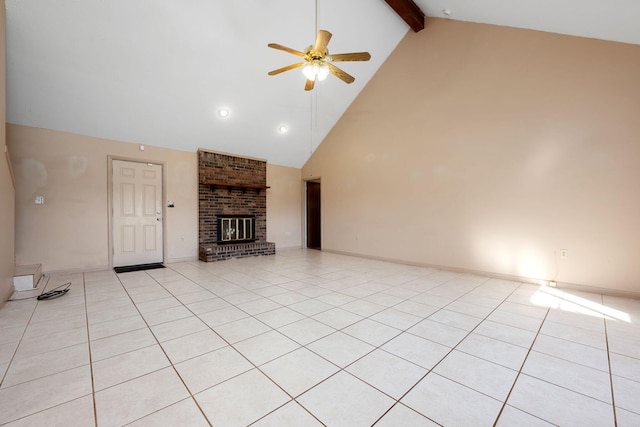 unfurnished living room with high vaulted ceiling, a brick fireplace, ceiling fan, light tile patterned floors, and beam ceiling