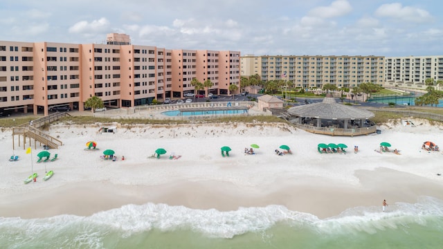 aerial view with a beach view and a water view