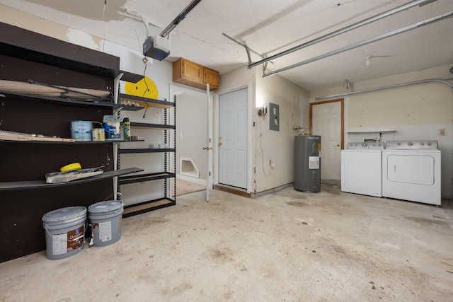 garage featuring electric panel, electric water heater, a garage door opener, and independent washer and dryer