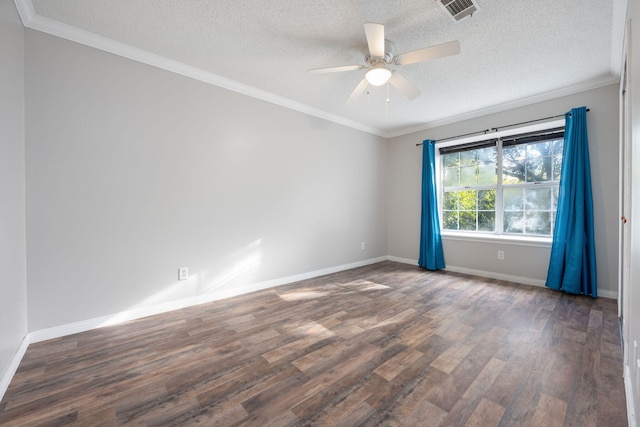 spare room with ceiling fan, dark hardwood / wood-style flooring, crown molding, and a textured ceiling