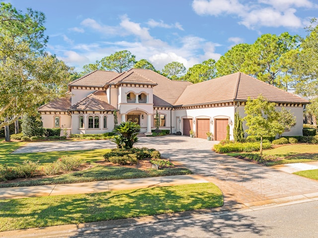 mediterranean / spanish-style house featuring a garage