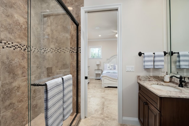 bathroom featuring vanity, crown molding, and walk in shower