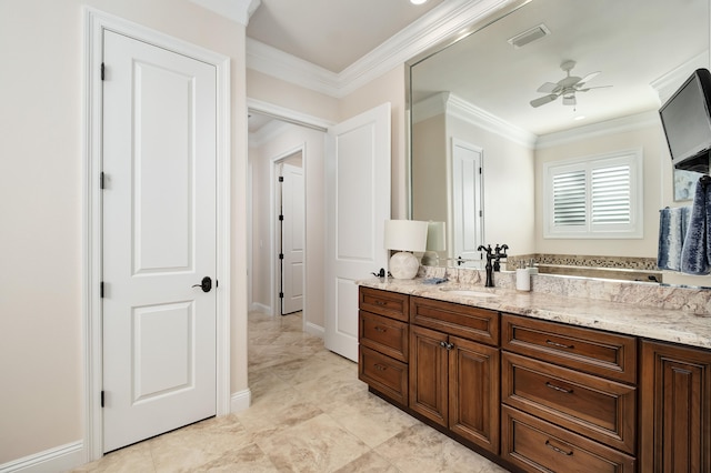 bathroom featuring vanity, ceiling fan, and ornamental molding