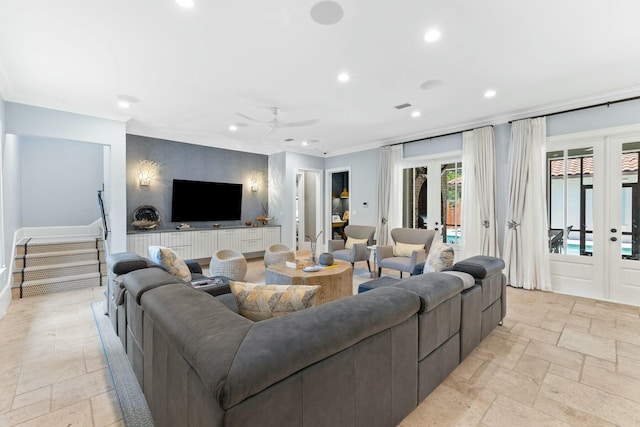 living room with ceiling fan, french doors, and ornamental molding