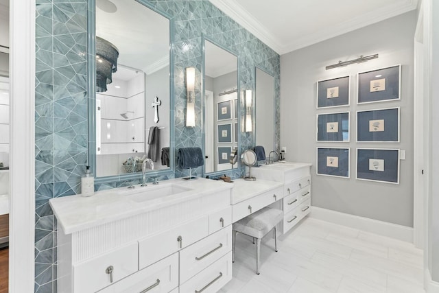 bathroom with vanity, tile walls, and ornamental molding