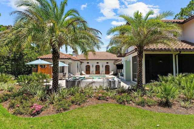 back of house with a patio area