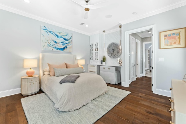 bedroom featuring dark hardwood / wood-style floors, ceiling fan, and ornamental molding