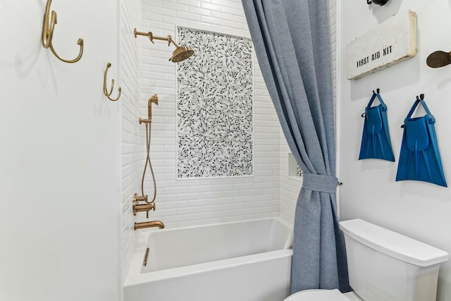 bathroom with shower / bath combination with curtain and toilet