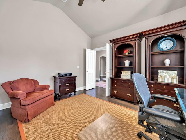 office with dark wood-type flooring, ceiling fan, and vaulted ceiling