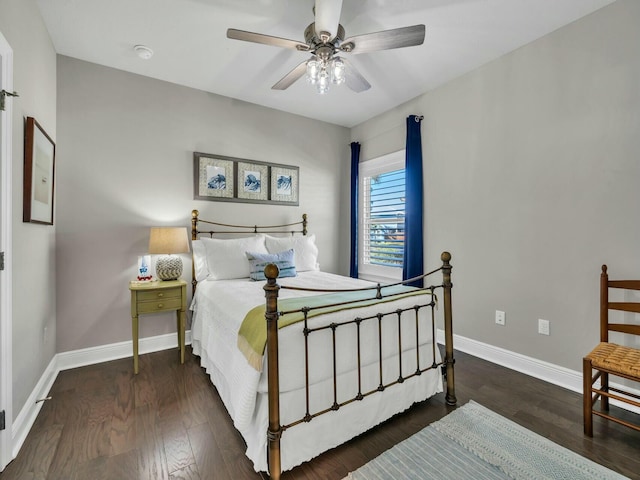 bedroom featuring ceiling fan and dark hardwood / wood-style flooring