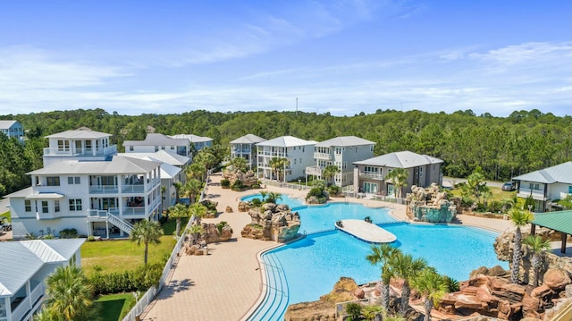 view of swimming pool featuring a patio area