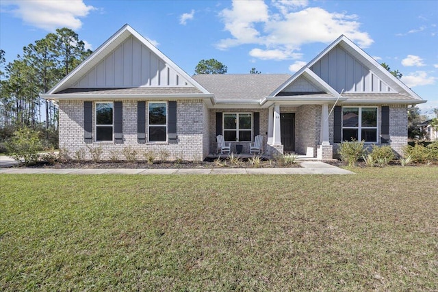 craftsman inspired home with a front yard