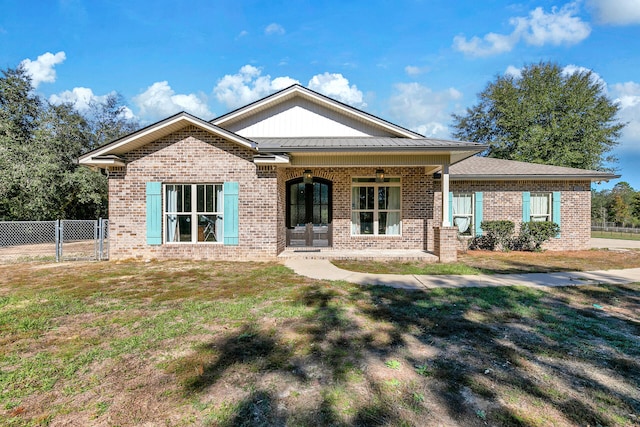 view of front of house with a front lawn