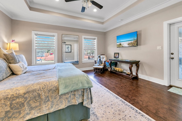 bedroom featuring multiple windows, ceiling fan, crown molding, and dark hardwood / wood-style floors