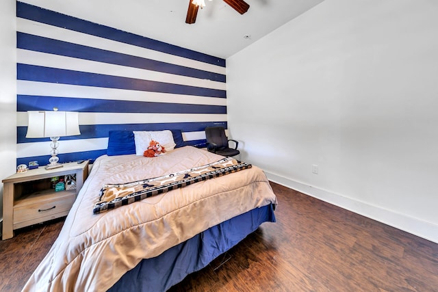 bedroom featuring lofted ceiling, ceiling fan, and dark hardwood / wood-style floors