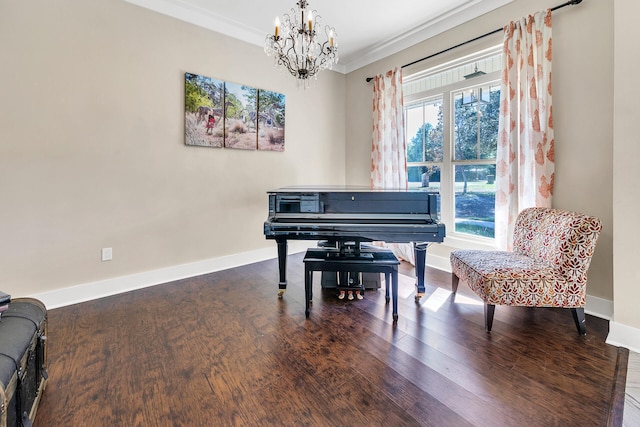 misc room featuring ornamental molding, a notable chandelier, and wood-type flooring