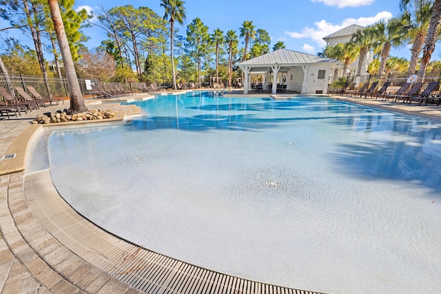 view of swimming pool with a patio