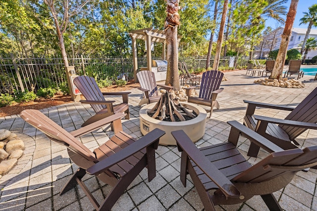 view of patio / terrace with a fire pit