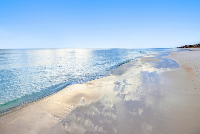 property view of water featuring a view of the beach