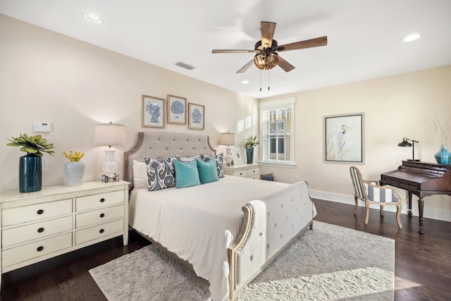 bedroom featuring ceiling fan and dark wood-type flooring