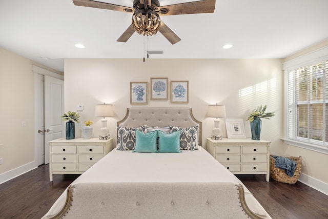 bedroom featuring dark wood-type flooring and ceiling fan