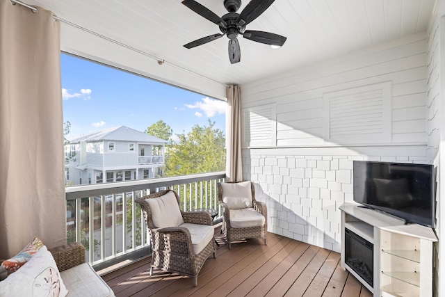 wooden terrace with ceiling fan