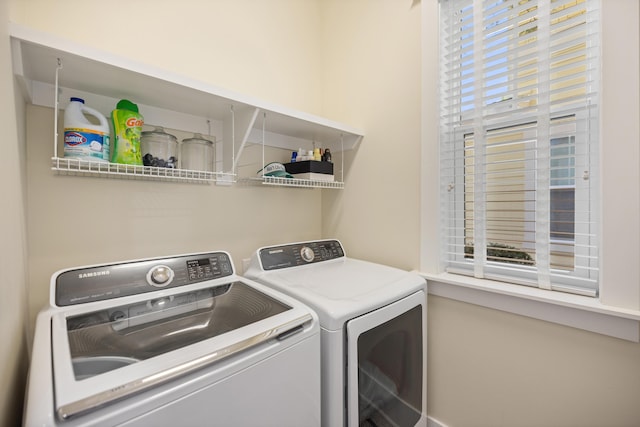 laundry room with washer and clothes dryer