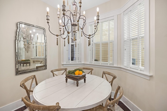 dining room featuring a notable chandelier