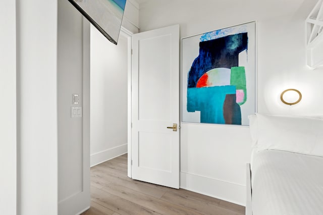 hallway featuring light hardwood / wood-style floors