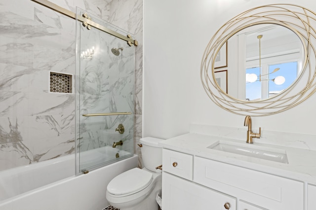 full bathroom featuring shower / bath combination with glass door, vanity, and toilet