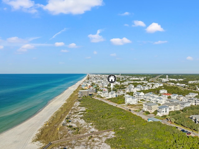 aerial view featuring a water view and a beach view