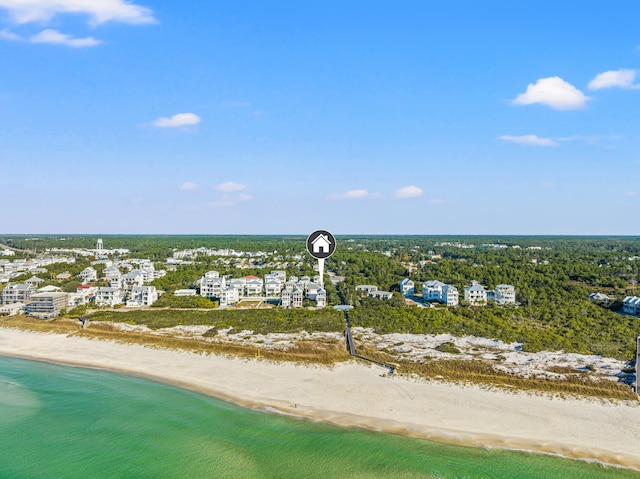 birds eye view of property featuring a view of the beach and a water view