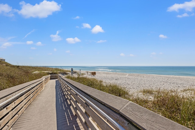 view of home's community with a view of the beach and a water view