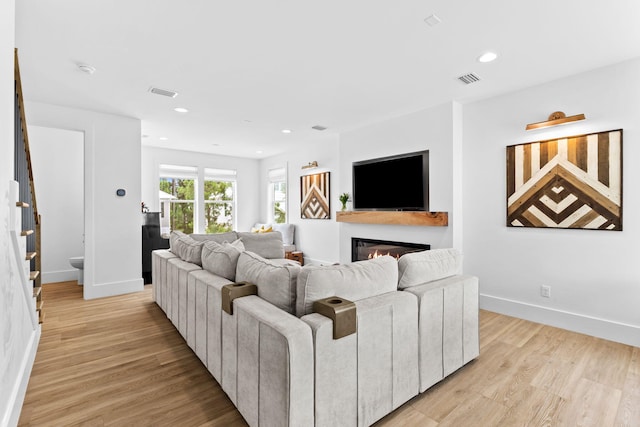 living room with light hardwood / wood-style floors