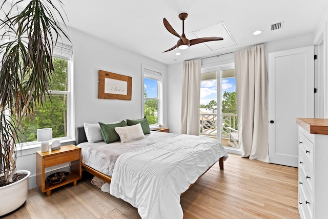 bedroom with ceiling fan, access to exterior, and light wood-type flooring