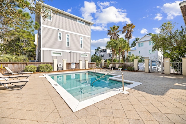 view of pool featuring a patio