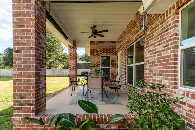 view of patio / terrace featuring ceiling fan