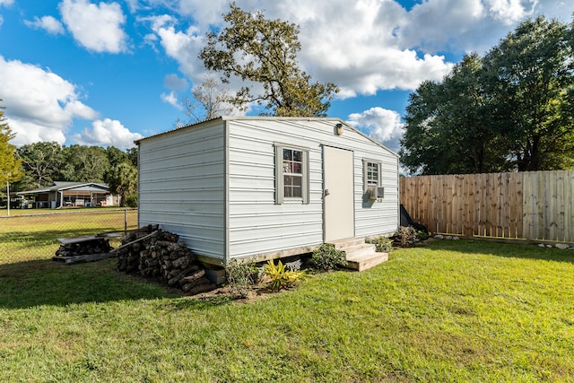 view of outdoor structure with a yard