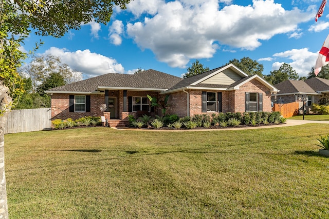 single story home featuring a front yard