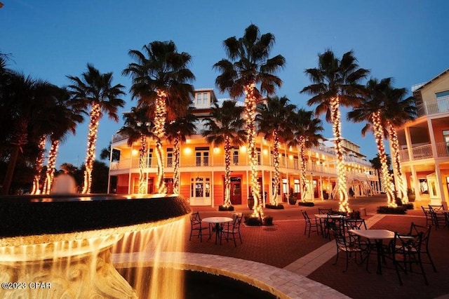 surrounding community featuring a patio area