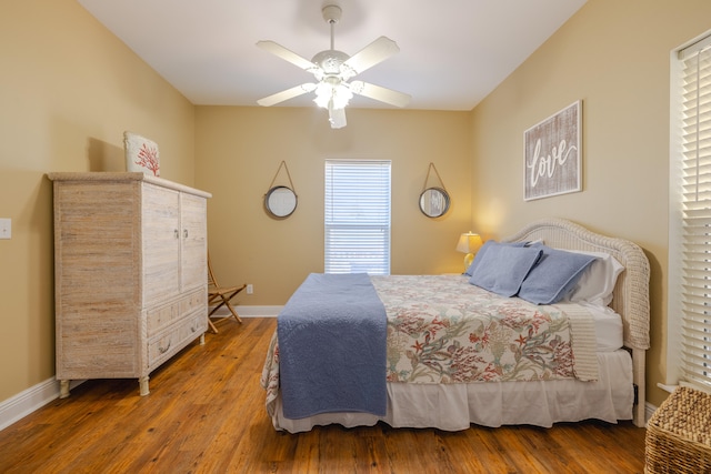 bedroom featuring ceiling fan and hardwood / wood-style flooring