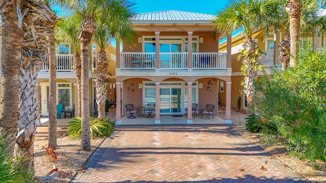 back of property with french doors