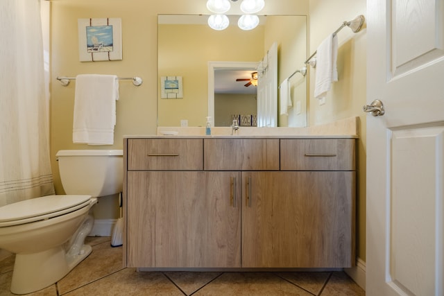 bathroom featuring ceiling fan, tile patterned flooring, and toilet