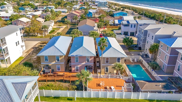 drone / aerial view with a view of the beach and a water view