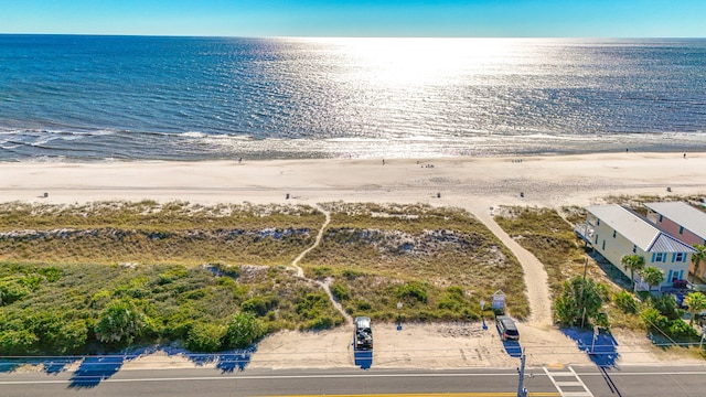 aerial view featuring a water view and a view of the beach